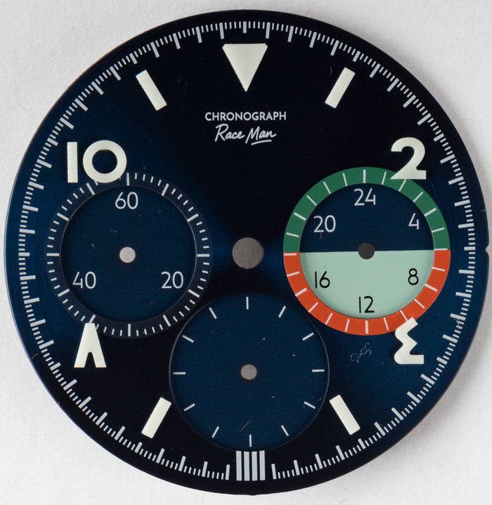 The textured Space Man dial and its International Orange register